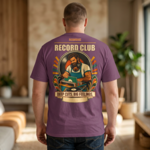 Deep Cuts Big Feelings T-shirt lifestyle back view with record-store bear, turntable, and vinyl artwork